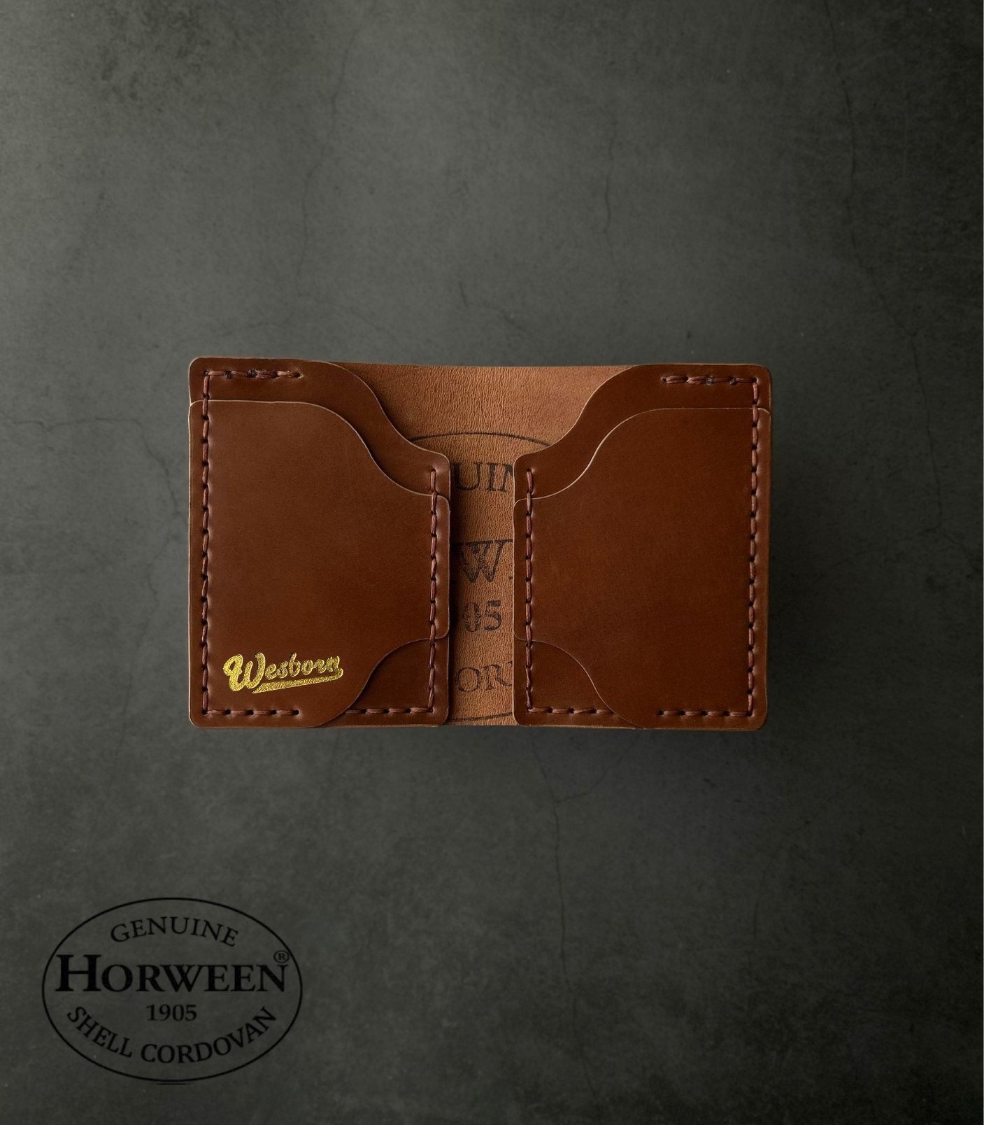 Brown leather wallet with 'Western' branding on a dark gray background